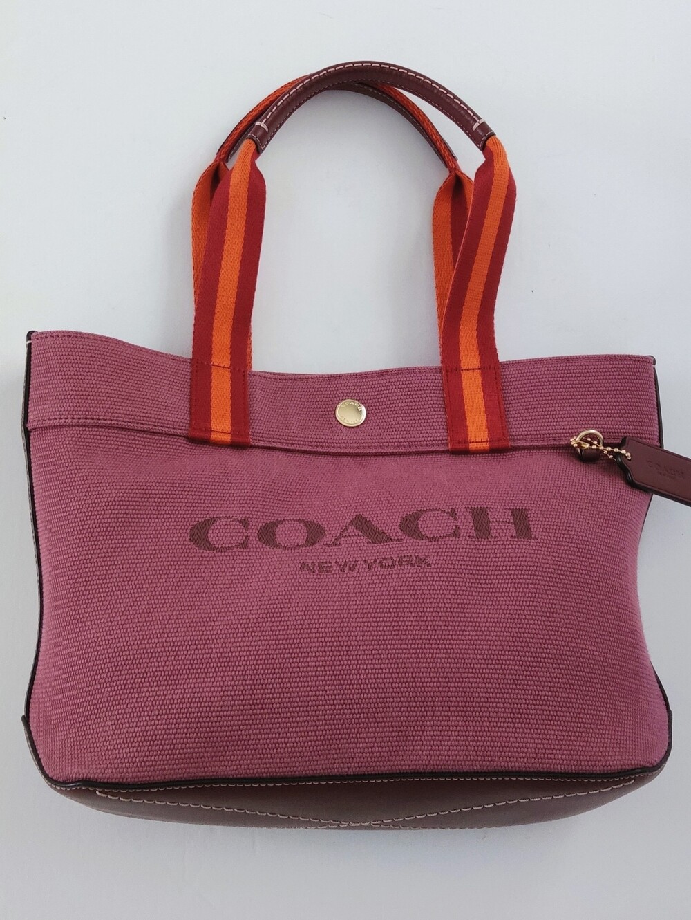 COACH Pink Canvas Tote with Striped Handles. Pre-owned. Excellent Condition.